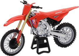 Red NEW-RAY 1:12 scale Honda CRF250R race bike replica from 2026, detailed accessories and realistic design.
