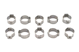 Oetiker oil hose clamp securing an oil tank, made of durable metal with a screw tightening mechanism for leak prevention.
