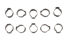 Oetiker oil hose clamp securing an oil tank hose, showing the metal clamp with a screw tightening mechanism.