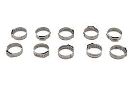 Oetiker oil hose clamp securing an oil tank hose, made of metal with a tightening mechanism for automotive or industrial use.