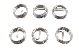 Helicoil engine thread insert for timing plug, showing a close-up of the metal component used for repair and reinforcement.