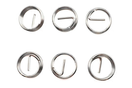 Helicoil thread insert for engine timing plug, metal repair kit for engine maintenance and bolt threading restoration.