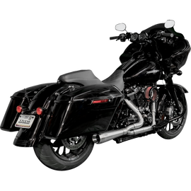TRASK Performance Assault Exhaust for Harley Bagger motorcycles, featuring sleek black design and chrome accents.