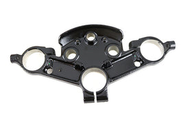 OE 49mm FLT front fork upper triple tree in black for motorcycle, showing the polished metal components and mounting points.