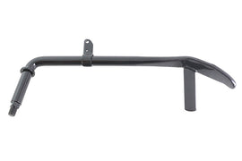 V-Twin 1-inch Jiffy kickstand in black attached to motorcycle chassis for stable support and secure parking.
