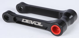 DEVOL suspension lowering link for bike, close-up view showing the metal component with mounting points and detailed finish