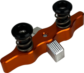 TAMER Tamer Double Button X Wing suspension in bright orange with dual buttons and aerodynamic X Wing design.