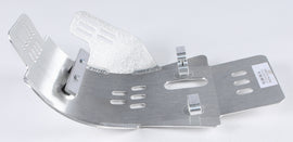 DEVOL skid plate guard for off-road vehicles, showing durable metal construction and mounting points on a rugged vehicle underside.