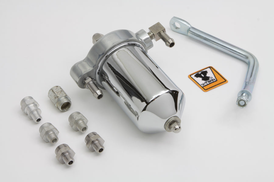 V-Twin oil filter canister kit installed on motorcycle oil tank, showing the durable metal canister and fitting components.