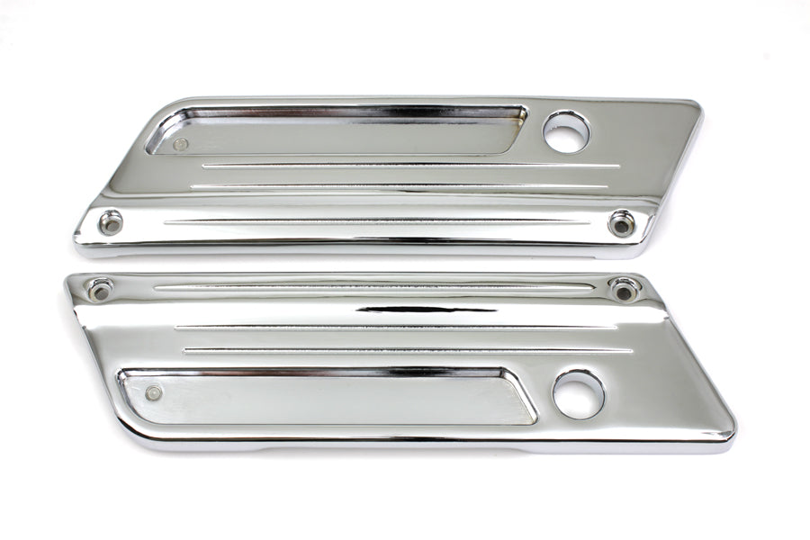 V-TWIN Wyatt Gatling saddlebag face plate for motorcycle seat and saddlebag, featuring detailed metal design and mounting hardware.