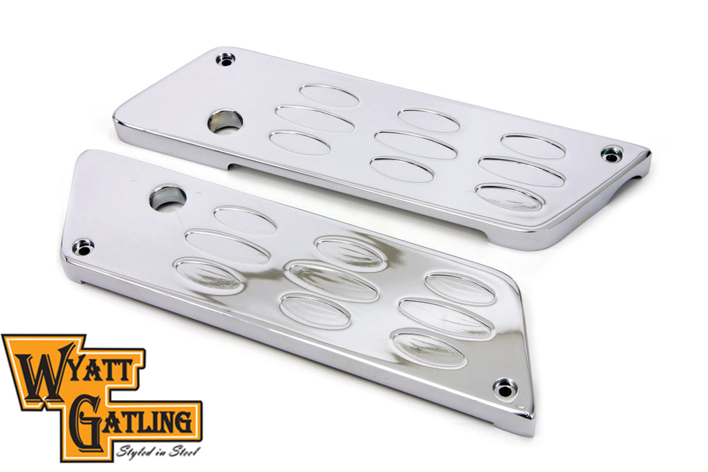 V-Twin Wyatt Gatling saddlebag face plate for motorcycle seat and saddlebag, featuring detailed metal design.