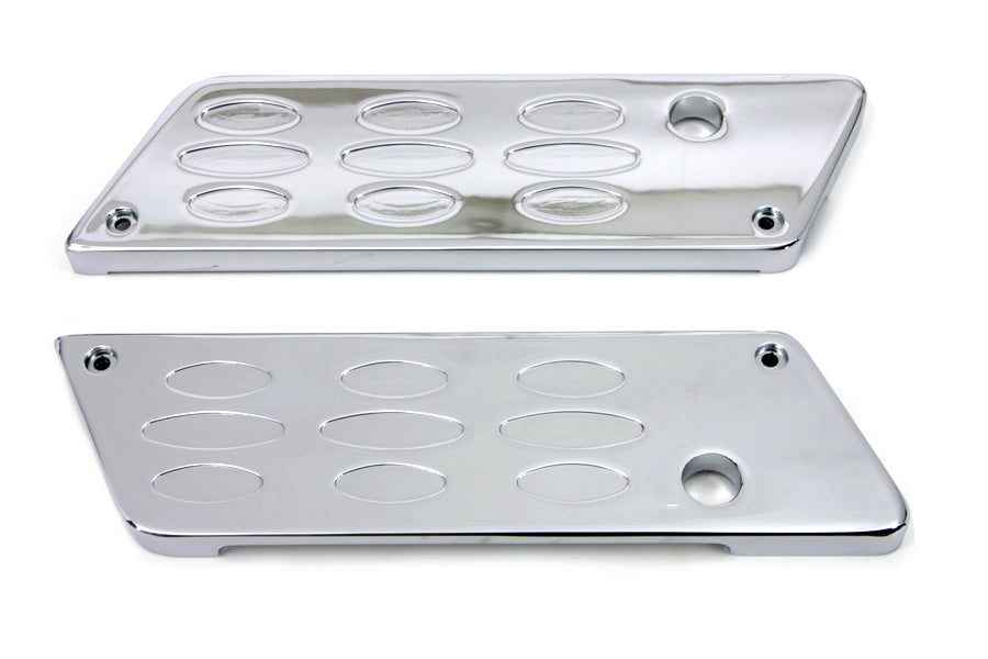 V-TWIN Wyatt Gatling saddlebag face plate for seat and saddlebag, featuring a detailed metal design on a motorcycle accessory