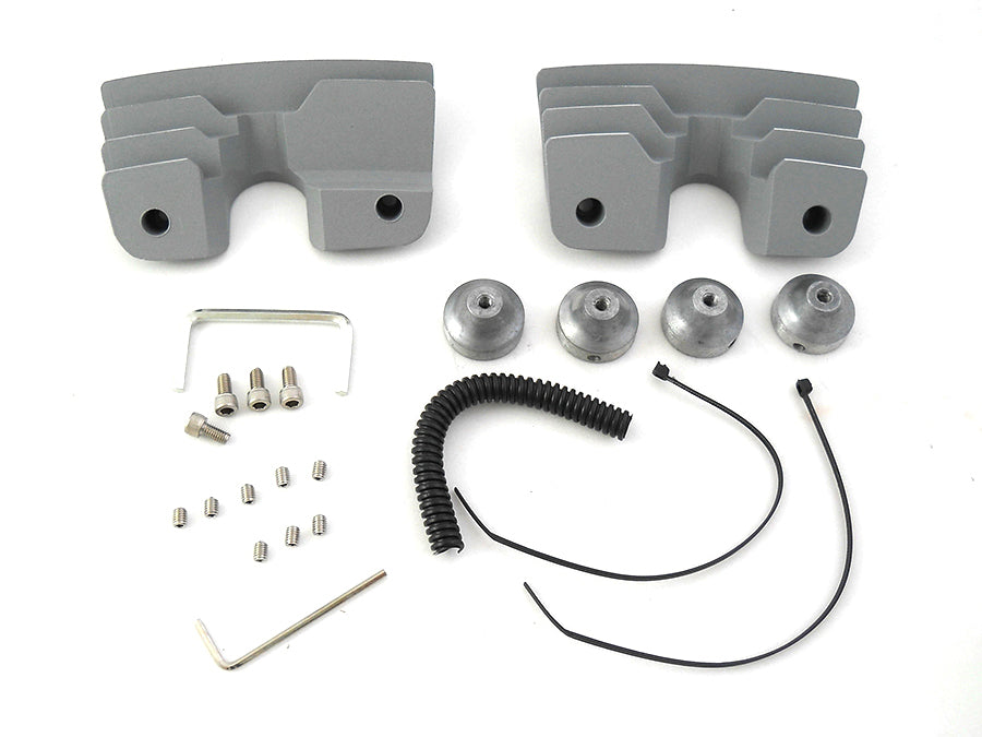 V-TWIN silver engine head bolt and spark plug cover kit with bolts and covers installed on a motorcycle engine.