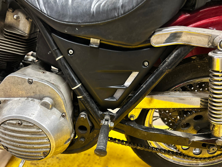 V-Twin FXR chassis side cover set with vented design for motorcycle frame, showing the metal covers with vent openings.