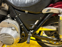Load image into Gallery viewer, V-Twin FXR chassis side cover set with vented design for motorcycle frame, showing the metal covers with vent openings.