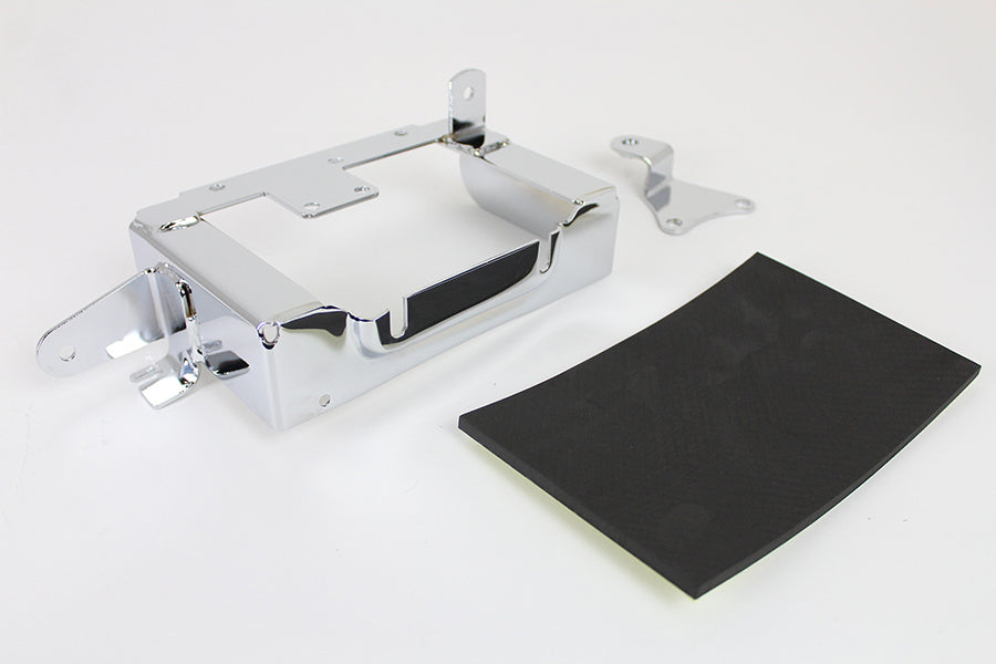 V-TWIN chrome battery carrier for motorcycle electrical system, featuring a shiny chrome finish and sturdy mounting design.