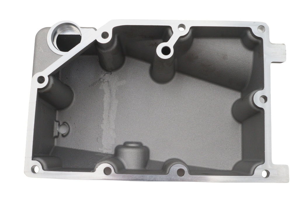 V-TWIN oil tank with oil pan cover, motorcycle engine component, black metal finish, detailed close-up of the oil pan cover.