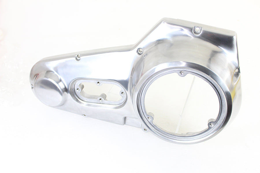 Polished MOTORSHOP drive line outer primary cover for motorcycle, showing a sleek, shiny metal finish with detailed engravings.
