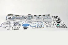 Load image into Gallery viewer, V-Twin chrome engine dress-up kit installed on motorcycle engine showcasing shiny chrome details and V-Twin branding.