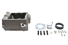 Load image into Gallery viewer, V-Twin 4-speed prepped transmission case for motorcycle, showcasing metal casing with mounting points and internal components.