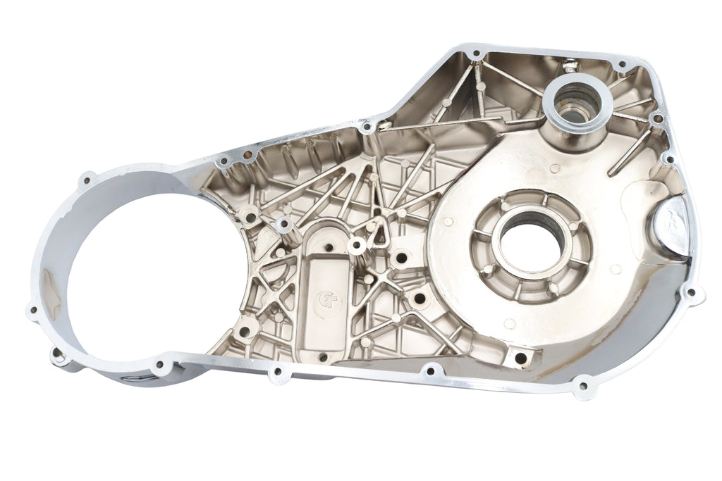 Motorshop Chrome Inner Primary Cover for motorcycle drive line, factory sample with polished chrome finish, detailed metal construction.