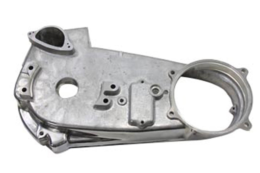 Polished V-Twin Factory Sample Inner Primary Cover for V-Twin Drive Line motorcycle, showcasing a shiny, detailed metal component