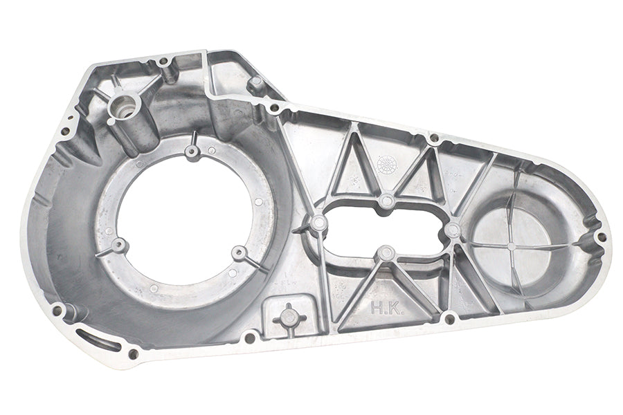 Polished outer primary cover for drive line by Motorshop, factory sample with a sleek, shiny finish on a motorcycle engine component.