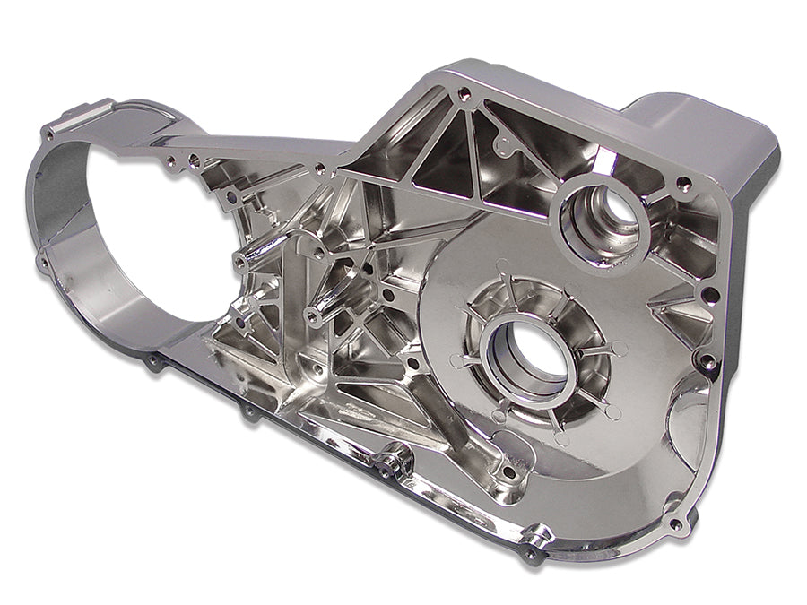 Chrome inner primary cover for motorcycle drive line by Motorshop, showcasing a shiny, polished chrome finish with detailed design accents.