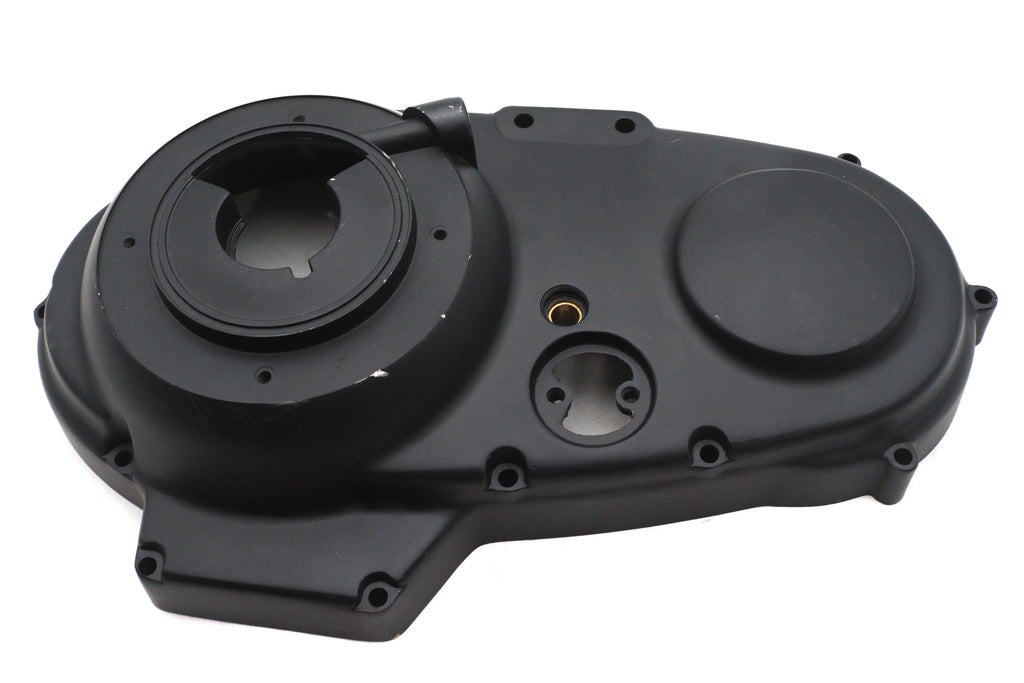 V-Twin Factory Sample Outer Primary Cover in black for V-Twin drive line motorcycle, showing detailed metal finish and mounting holes.