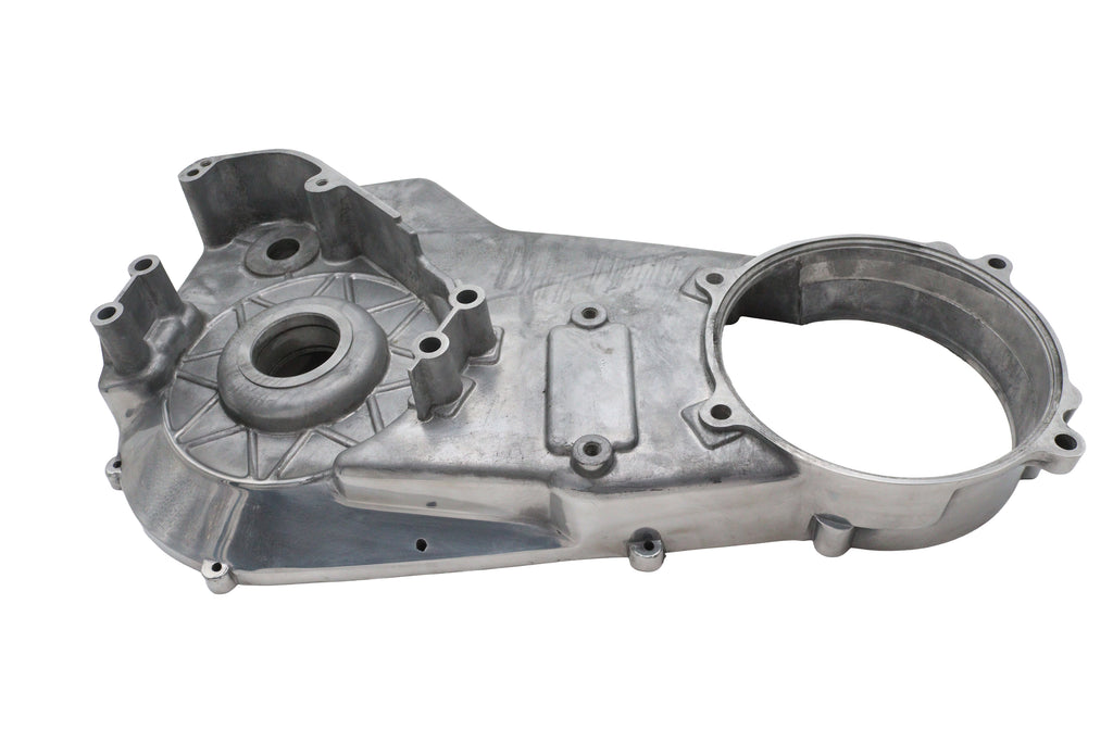 Polished V-Twin Factory Sample Inner Primary Cover for drive line, showcasing a shiny, smooth finish on a motorcycle engine component.