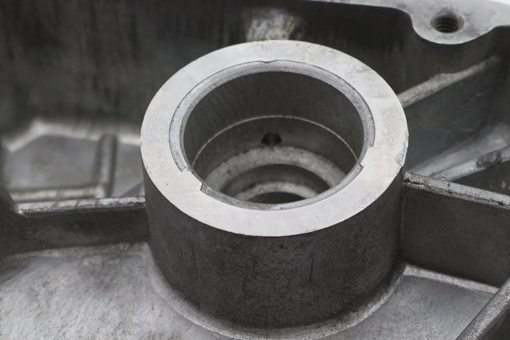 Polished V-TWIN Factory Sample Inner Primary Cover for drive line, showcasing a shiny, polished metal finish on a motorcycle part.