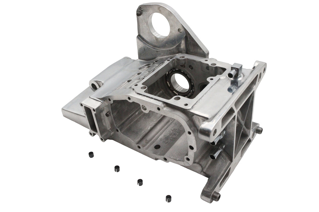 Polished Ultima 6-speed transmission case, durable and sleek, designed for high-performance automotive applications.