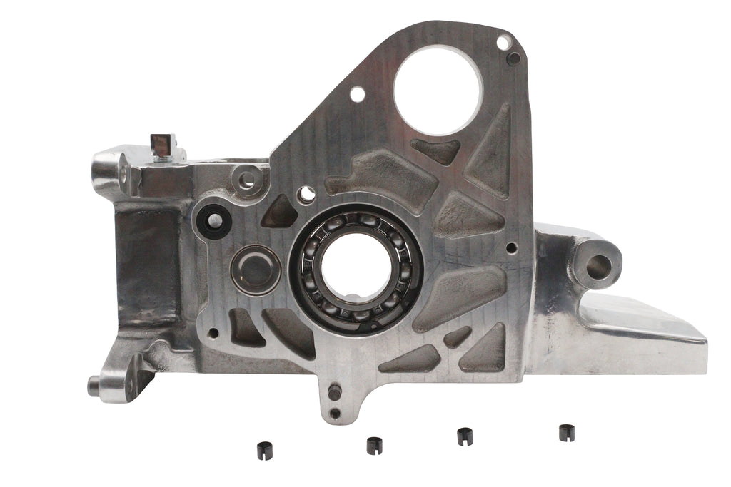 Polished Ultima 6-speed transmission case for automotive upgrade, showcasing durable metal construction and precise craftsmanship.