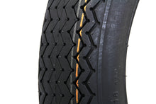 Load image into Gallery viewer, Coker Tire Firestone Replica 4.00 x 18 inch Indian Script wheel and tire for vintage vehicles, showcasing the classic design and branding.