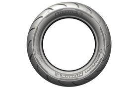Michelin Commander III 80/90-21 front cruiser tire mounted on wheel, showcasing tread pattern and sidewall design.