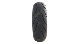 Michelin Commander III 180/65 B16 rear touring motorcycle tire mounted on wheel, showing tread pattern and sidewall details.
