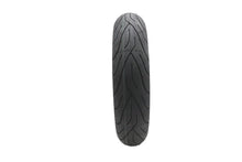 Load image into Gallery viewer, Michelin Commander II MT90 B16 front motorcycle tire mounted on wheel, showcasing tread pattern and sidewall details.