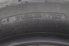 Load image into Gallery viewer, Michelin Commander II MT90 B16 front motorcycle tire mounted on wheel, showing tread pattern and sidewall details.