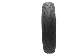 Michelin Commander II rear motorcycle tire 130/90 B16 mounted on wheel, showing tread pattern and sidewall details.