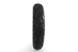 Rear Michelin Commander II motorcycle tire 140/90 B16 mounted on wheel, showing tread pattern and sidewall details.