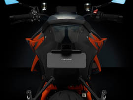 RIZOMA Flat Out Fender Eliminator kit installed on KTM motorcycle body, showcasing sleek, black design with license plate mount.
