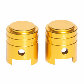 Two gold RFX tire valve caps with a shiny finish, designed as stylish wheel accessories for vehicle tires.