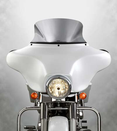 National Cycle V-Stream Light Tint ultra low windshield on motorcycle with sissy bar, providing wind protection and a sleek look.
