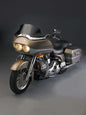 Dark tint V-Stream windshield for motorcycle with low profile design, fitting sissy bar and providing wind protection.