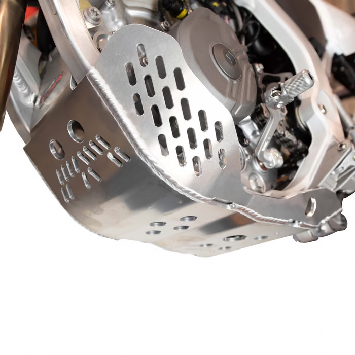 Enduro Engineering skid plate for motorcycle body protection, durable black metal design with mounting hardware visible.