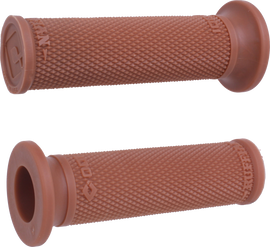 ODI Ruffian Slip-On Grips in graphite color, rubber handlebar grips for bikes, with textured surface and ergonomic design.