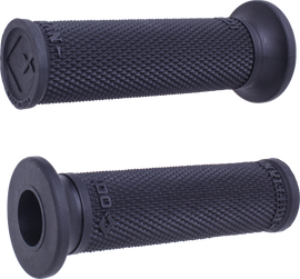 Black ODI Ruffian slip-on grips for bike handlebars, featuring textured rubber surface and ergonomic design.