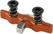 Load image into Gallery viewer, Tamer Double Button X Wing Orange suspension device with two buttons, designed for secure mounting and suspension applications.