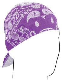 ZAN Flydanna Muerte headgear featuring a black bandana with skull and floral patterns, tied around a person's head.