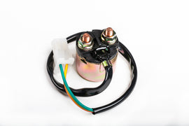 Electrical RICKS solenoid switch with metal connectors and wiring terminals, used for controlling electrical circuits.